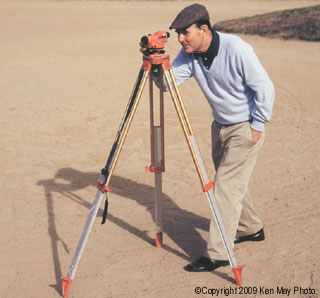 Golf Course Architect Pete Dye with transit
